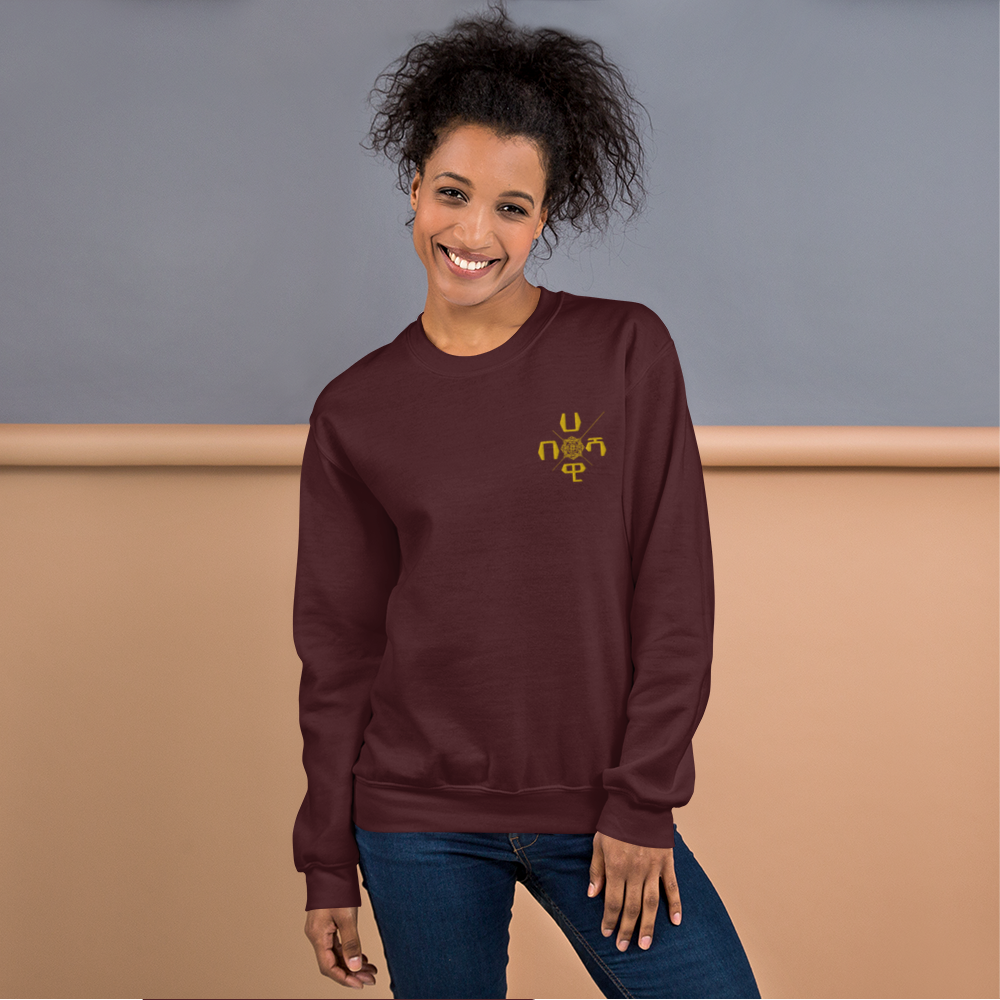 This well-loved X-Habeshawwi Unisex Sweatshirt is the perfect addition to any wardrobe. It has a crew neck, and it's made from air-jet spun yarn and quarter-turned fabric, which eliminates a center crease, reduces pilling, and gives the sweatshirt a soft, comfortable feel. 